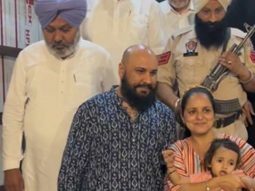 B Praak poses with fans as he gets clicked by paps