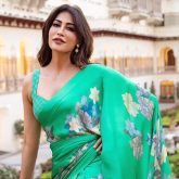 Chitrangda Singh radiates timeless elegance in regal green saree amid majestic palace backdrop