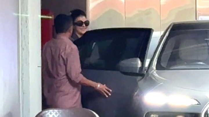 Jacqueline Fernandez wave to the paps