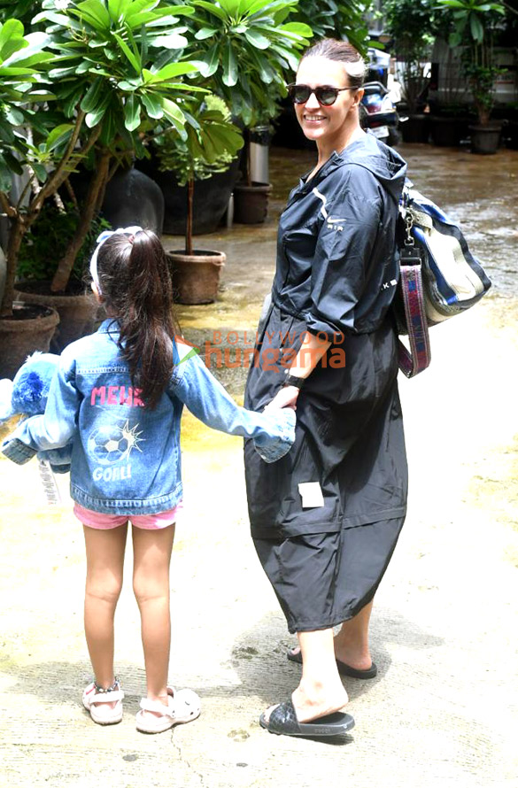 Photos: Neha Dhupia snapped with her daughter Mehr at a school in Bandra Photos: Neha Dhupia snapped with her daughter Mehr at a school in Bandra