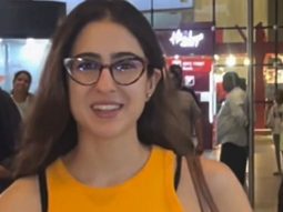 Specsy Sara Ali Khan papped at the airport in an orange tee