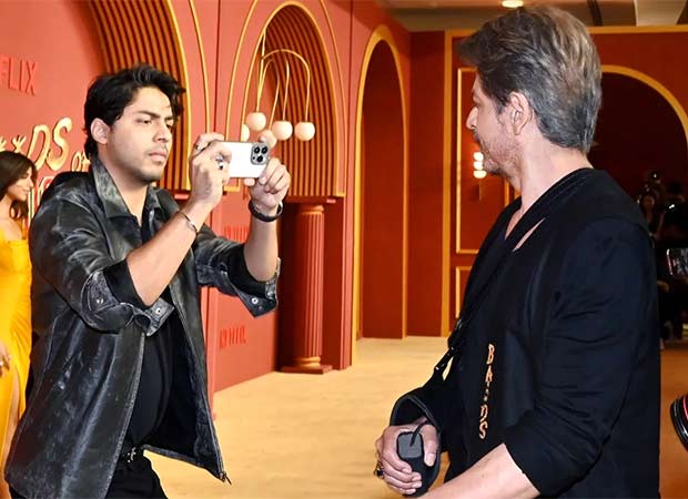 Aryan Khan becomes photographer as Shah Rukh Khan strikes a pose with paparazzi at The Ba***ds of Bollywood premiere