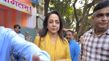 Hema Malini flashes a warm smile while proudly showing her inked finger