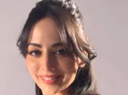 Zoya Afroz in a rosy red dress