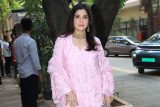 Maheep Kapoor papped in a pretty pink suit