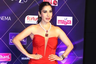 Sophie Choudry steals the show in a bold red gown