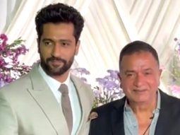 Vicky Kaushal with papa Shyam Kaushal pose for media