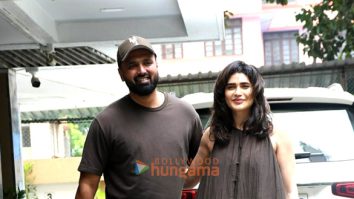 Photos: Karishma Tanna snapped with her husband and her newborn child as she returns to her home in Bandra