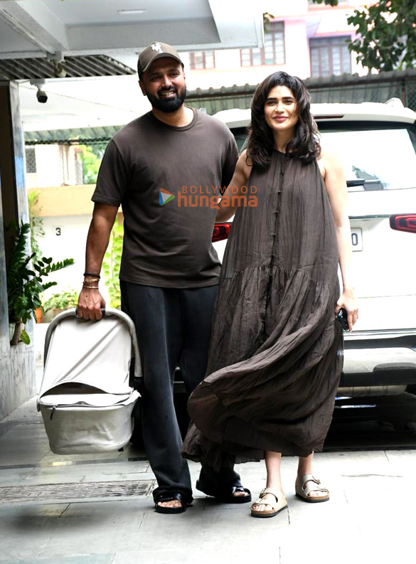 Photos: Karishma Tanna snapped with her husband and her newborn child as she returns to her home in Bandra Photos: Karishma Tanna snapped with her husband and her newborn child as she returns to her home in Bandra