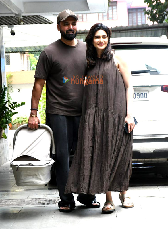 photos karishma tanna snapped with her husband and her newborn child as she returns to her home in bandra 6