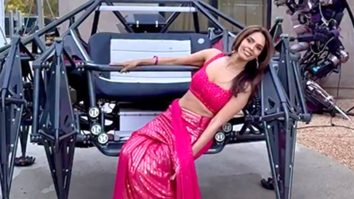 Mallika Sherawat showing her playful side in a striking pink saree
